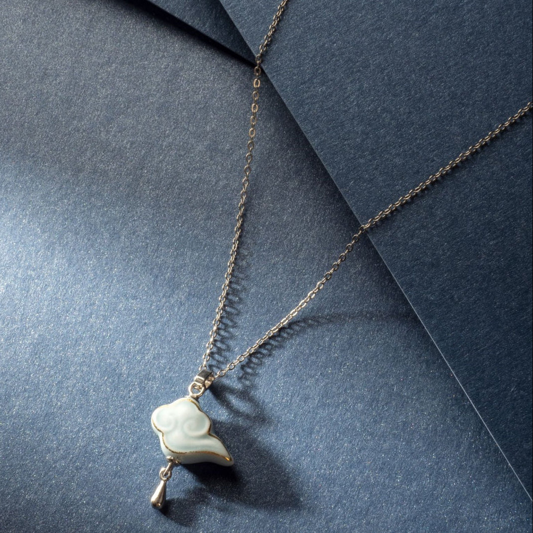 Artisanal Cloud-Themed Light Blue Ceramic Jewelry Set with Golden Patterns