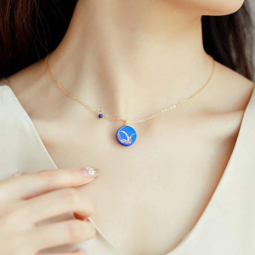 Handcrafted Blue Ceramic Orchid-Themed Jewelry Collection with Golden Floral Patterns