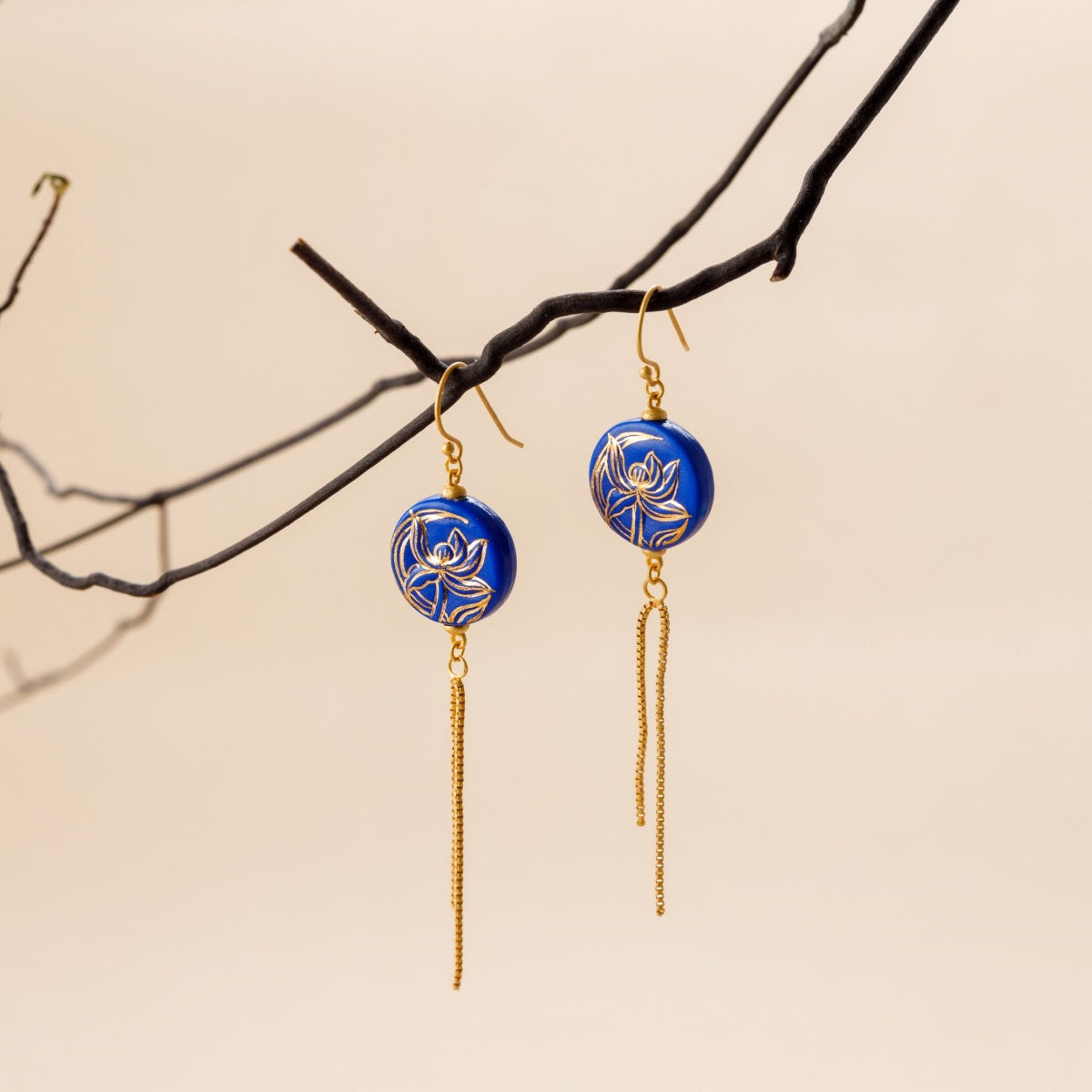 Handcrafted Blue Ceramic Orchid-Themed Jewelry Collection with Golden Floral Patterns