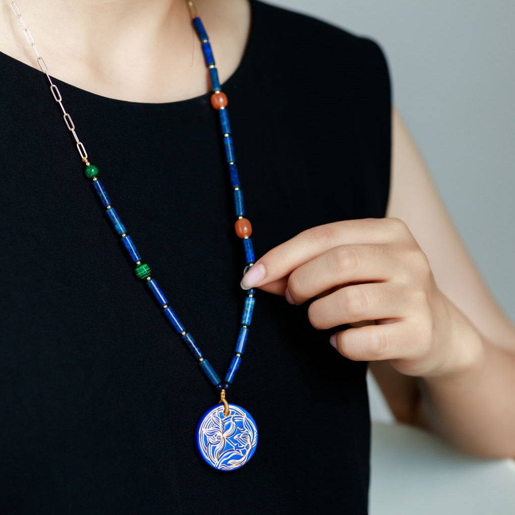 Handcrafted Blue Ceramic Orchid-Themed Jewelry Collection with Golden Floral Patterns