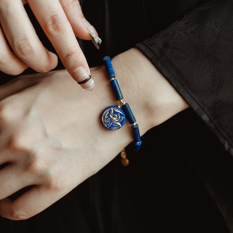 Handcrafted Blue Ceramic Orchid-Themed Jewelry Collection with Golden Floral Patterns